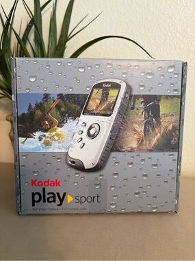 Kodak PlaySport (Zx3) HD 1080p Waterproof Pocket Video Camera (Purple) w/ Remote